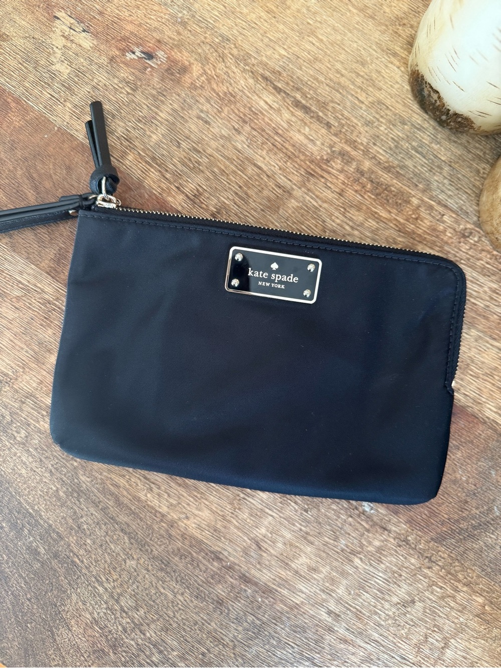 Kate Spade New York black wristlet double pouch with gold logo